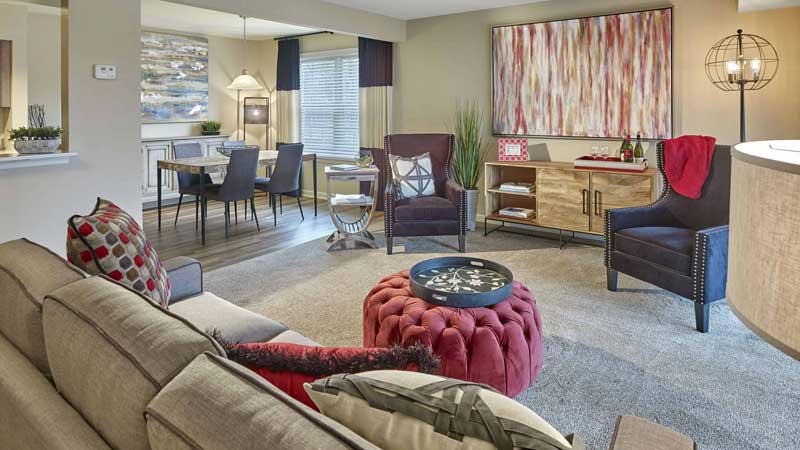 Multifamily furnished apartment living and dining room area